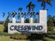 Attractive Cresswind Lakewood Ranch community entrance sign surrounded by manicured landscaping and palm trees at 4988 Fairhope Cir, Lakewood Ranch, FL 34211