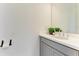 Stylish half-bath with modern fixtures and a sleek vanity at 501 Maraviya Blvd, Nokomis, FL 34275