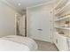 Bedroom featuring a closet with double doors and built-in shelving at 501 Maraviya Blvd, Nokomis, FL 34275