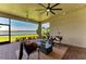 Inviting covered patio with views of the lake and lush landscaping at 501 Maraviya Blvd, Nokomis, FL 34275