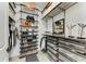A spacious walk-in closet with custom shelving, drawers, and ample storage for shoes and accessories at 501 Maraviya Blvd, Nokomis, FL 34275
