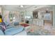 Inviting living room with tile flooring, stylish furniture, and an open floor plan at 5047 Newport News Cir, Bradenton, FL 34211