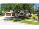 Charming single-Gathering home with a two-car garage and a well-maintained front yard and sidewalk at 5240 Silver Charm Ter, Wesley Chapel, FL 33544