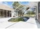 Spacious screened-in pool area, offering a private oasis for relaxation and recreation at 5240 Silver Charm Ter, Wesley Chapel, FL 33544