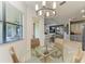 Bright breakfast nook with views into the kitchen and living area at 5511 Foxfire Run, Lakewood Ranch, FL 34211