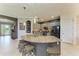 Spacious kitchen features a large island, stainless steel appliances, and ample counter space for meal preparation at 5511 Foxfire Run, Lakewood Ranch, FL 34211