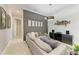 Comfortable living room with stylish decor and neutral tones, ideal for relaxation and entertaining at 5511 Foxfire Run, Lakewood Ranch, FL 34211