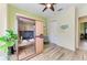 Inviting sauna room highlighting a modern sauna, bright green walls and lots of sunlight at 5511 Foxfire Run, Lakewood Ranch, FL 34211