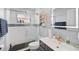 Modern bathroom featuring a glass shower, mosaic tile accent, and floating vanity at 5565 Sweetwater Oak Dr, Sarasota, FL 34232