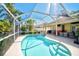 A bright and sunny view of the sparkling pool, with steps leading into the refreshing water at 5565 Sweetwater Oak Dr, Sarasota, FL 34232