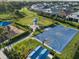Aerial view of the community's amenities including a playground, dog park, and basketball court at 6239 Baywood Ct, Bradenton, FL 34211