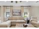 Cozy living room showcasing a comfortable sofa, neutral tones, natural light, and stylish accents at 6239 Baywood Ct, Bradenton, FL 34211