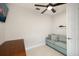 This office includes a ceiling fan and a daybed for relaxing during the work day at 6239 Baywood Ct, Bradenton, FL 34211