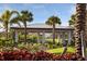 Community picnic pavilion surrounded by lush landscaping, providing a shaded area for outdoor gatherings and relaxation at 6239 Baywood Ct, Bradenton, FL 34211