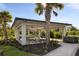 Community picnic pavilion surrounded by lush landscaping, providing a shaded area for outdoor gatherings and relaxation at 6239 Baywood Ct, Bradenton, FL 34211