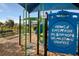 Community playground with colorful play equipment and a soft mulch surface, providing a fun and safe recreational area at 6239 Baywood Ct, Bradenton, FL 34211