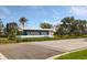 Entrance to Sapphire Point is marked with a sleek sign and lush landscaping at 6239 Baywood Ct, Bradenton, FL 34211