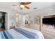 Comfortable bedroom with ceiling fan, neutral walls and closet space at 712 68Th W Ave, Bradenton, FL 34207