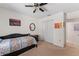 Bedroom featuring a comfortable bed, soft carpeting, and a closet at 712 68Th W Ave, Bradenton, FL 34207