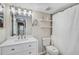 Bright bathroom featuring a new sink and vanity at 7211 Cloister Dr # 101, Sarasota, FL 34231
