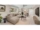 Cozy living room with a comfortable sofa and stylish decor at 7211 Cloister Dr # 101, Sarasota, FL 34231