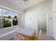 Eat-in kitchen area with vaulted ceilings and backyard views from the window at 7432 Birds Eye Ter, Bradenton, FL 34203