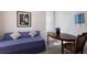 Office featuring blue sofa, dining table, and chair at 7432 Birds Eye Ter, Bradenton, FL 34203