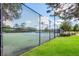 Community tennis courts with fencing and well-maintained green surroundings at 7432 Birds Eye Ter, Bradenton, FL 34203