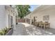 Inviting backyard patio with comfortable dining, connecting indoor and outdoor spaces seamlessly for entertaining at 815 N East Ave, Sarasota, FL 34237