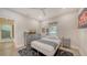 Bedroom with wood floors, ceiling fan, and decor at 815 N East Ave, Sarasota, FL 34237