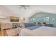 Cozy bedroom retreat with a bed, sitting area, and a functional workspace at 815 N East Ave, Sarasota, FL 34237