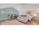 Bright bedroom with desk area, full bed, and sitting area for relaxing at 815 N East Ave, Sarasota, FL 34237