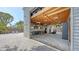 Well-organized garage interior with storage shelves, work area, and ample space for parking and hobbies at 815 N East Ave, Sarasota, FL 34237