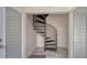Unique spiral staircase connecting floors, adding architectural interest at 815 N East Ave, Sarasota, FL 34237