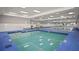 Indoor pool with shallow end and starting blocks at 1111 Harefield Cir, Sun City Center, FL 33573