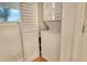 Conveniently located, this well-lit laundry area features a stacked washer and dryer at 1115 Gulf Of Mexico Dr # 304, Longboat Key, FL 34228