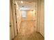 Bedroom featuring neutral walls and tile flooring, with a window allowing natural light at 119 Maraviya Blvd, Nokomis, FL 34275
