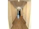 Inviting foyer with tray ceiling, tile flooring, and arched doorways at 119 Maraviya Blvd, Nokomis, FL 34275
