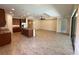 Open kitchen with dark cabinetry, an island, granite countertops, and stainless steel appliances at 119 Maraviya Blvd, Nokomis, FL 34275
