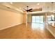 Spacious living room with tile floors, large windows, and easy access to the lanai at 119 Maraviya Blvd, Nokomis, FL 34275