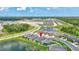 Aerial view of new home community near multiple lakes with lush landscapes and green spaces at 12743 Tahitian Pearl Cir, Parrish, FL 34219