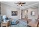 Cozy office space with comfortable seating, a desk, and stylish decor at 12743 Tahitian Pearl Cir, Parrish, FL 34219