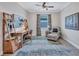 Versatile office space featuring a desk, comfortable seating, and a stylish rug at 12743 Tahitian Pearl Cir, Parrish, FL 34219