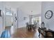 Inviting dining room with a chandelier, dining table set, and hardwood floors at 1451 Fawnwood Cir, Sarasota, FL 34232