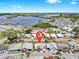 Aerial view of a waterfront community offering charming homes and beautiful scenery at 17 Braden Castle Dr, Bradenton, FL 34208