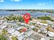 Aerial view shows proximity to water, boat docks, and surrounding neighborhood at 17 Braden Castle Dr, Bradenton, FL 34208