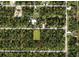 Aerial view of a vacant lot surrounded by residential streets, highlighting its potential for development at 17461 Dudley Ave, Port Charlotte, FL 33954