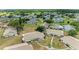 Community aerial view featuring well-maintained homes, lush landscaping, and tranquil surroundings at 1906 Canterbury Ln # 16, Sun City Center, FL 33573