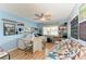 Inviting bedroom with blue walls, ceiling fan, and a comfortable daybed at 1906 Canterbury Ln # 16, Sun City Center, FL 33573