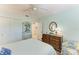 Light and airy bedroom with a closet and an adjacent bathroom for added privacy at 1906 Canterbury Ln # 16, Sun City Center, FL 33573